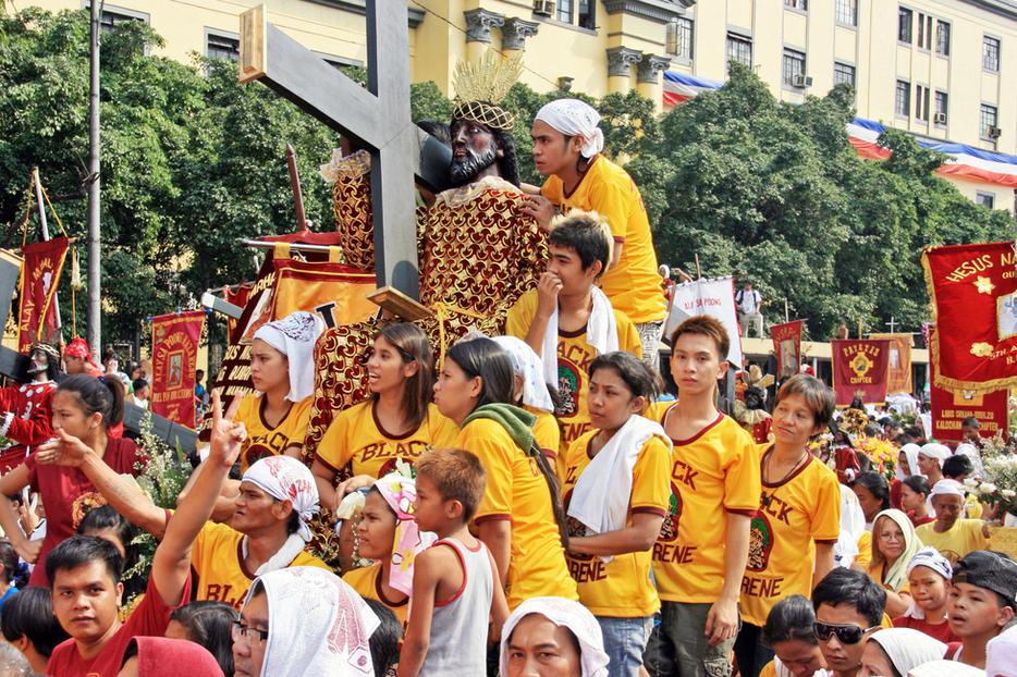 Catholics celebrate the Feast of The Black Nazarene on January 9, 2010 in Manila Philippines. Catholics celebrate the Feast of The Black Nazarene on January 9, 2010 in Manila Philippines.