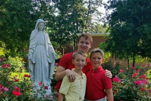 Left to right are Patrick (yellow shirt), Brendan (middle), and Sean Lacey. The picture was taken in July 2017 in the Rose garden at the family parish, St. Rose of Lima, after the healings. Patrick is now 14, Brendan is 16, and Sean is 13. Left to right are Patrick (yellow shirt), Brendan (middle), and Sean Lacey. The picture was taken in July 2017 in the Rose garden at the family parish, St. Rose of Lima, after the healings. Patrick is now 14, Brendan is 16, and Sean is 13.