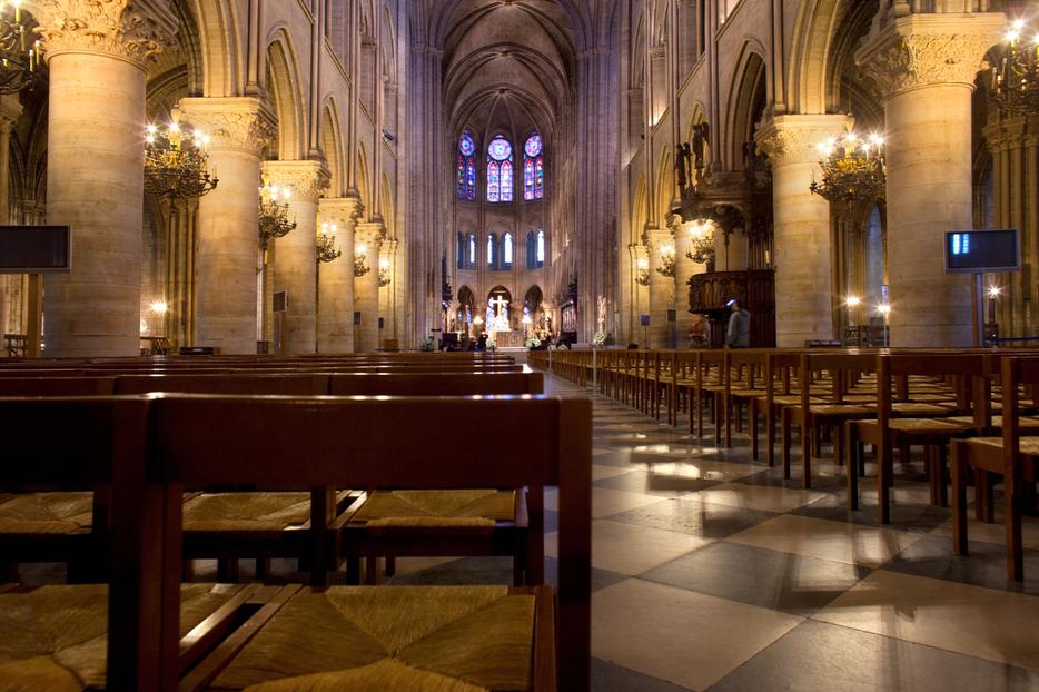 Empty chairs at the interior of Notre Dame Cathedral. Empty chairs at the interior of Notre Dame Cathedral.