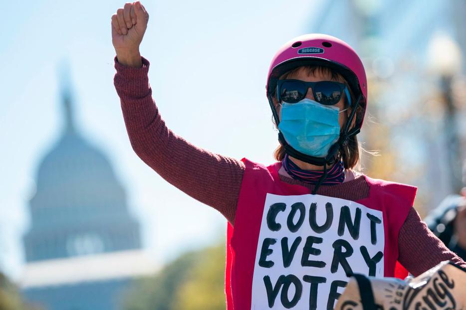 A demonstrator protests the day after the election near the US Capitol on November 4, 2020 in Washington, DC. A demonstrator protests the day after the election near the US Capitol on November 4, 2020 in Washington, DC.
