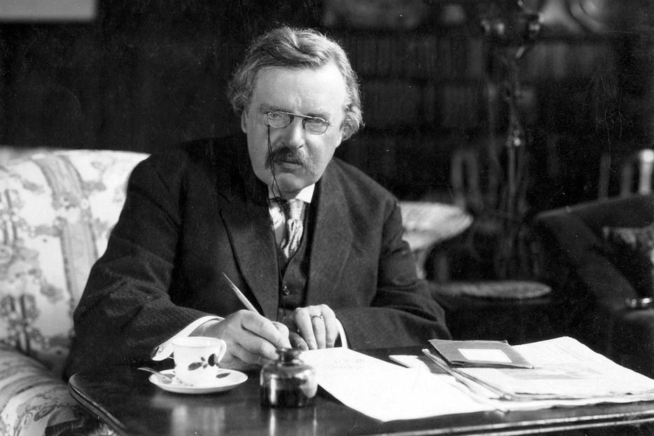 G.K. Chesterton at work G.K. Chesterton at work