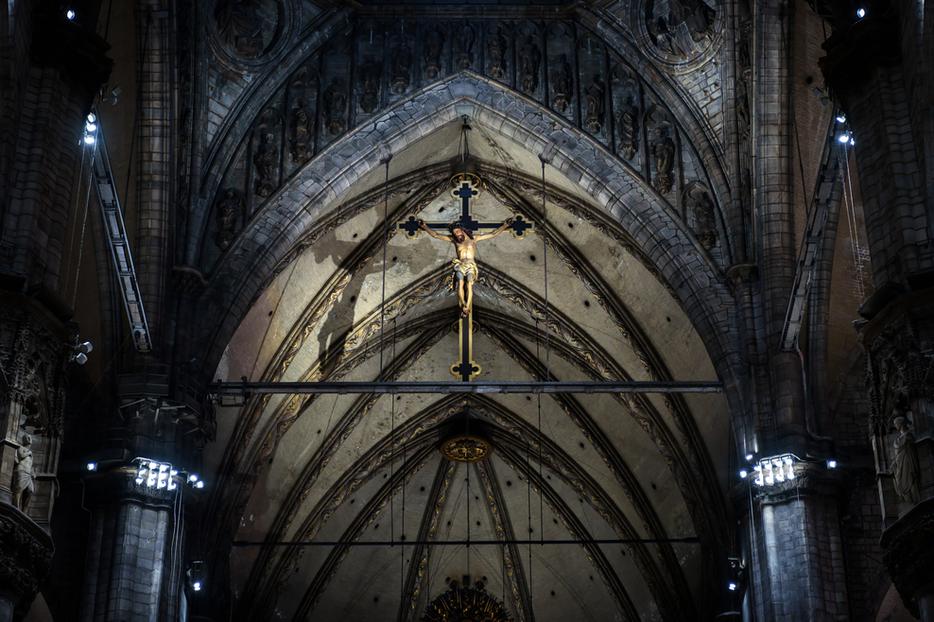 A crucifix above the altar inside the Duomo in Milan. A crucifix above the altar inside the Duomo in Milan.