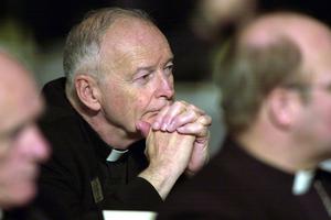 Bishop Theodore McCarrick listens to Craig Martin, a child victim of sexual abuse by a priest, as he delivers remarks to the U.S. Conference of Catholic Bishops June 13, 2002 in Dallas, Texas. Bishop Theodore McCarrick listens to Craig Martin, a child victim of sexual abuse by a priest, as he delivers remarks to the U.S. Conference of Catholic Bishops June 13, 2002 in Dallas, Texas.