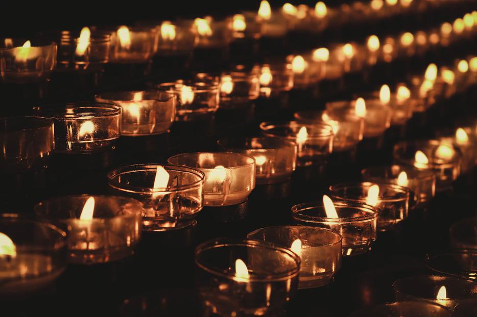 Candles are lit in Cologne Cathedral in Germany. Candles are lit in Cologne Cathedral in Germany.
