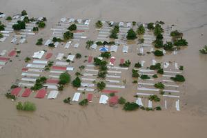 Aerial view an area around San Pedro Sula, 240 km north of Tegucigalpa, flooded by the overflowing of the Chamelecon river after the passage of Hurricane Iota, taken on November 18, 2020. Aerial view an area around San Pedro Sula, 240 km north of Tegucigalpa, flooded by the overflowing of the Chamelecon river after the passage of Hurricane Iota, taken on November 18, 2020.