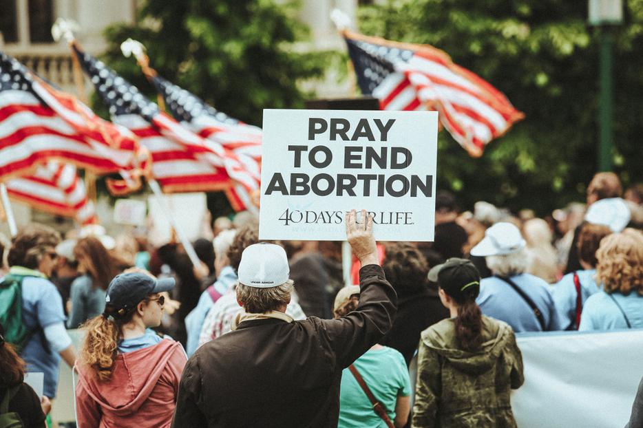 Pro-life rally outside an abortion facility. Pro-life rally outside an abortion facility.