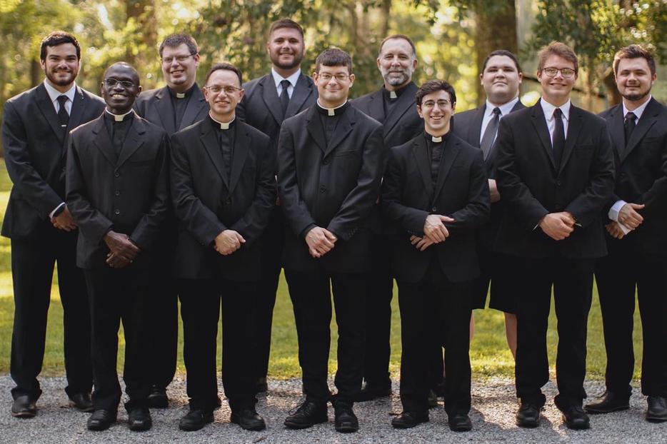Chad Chermaie Jr., shown in the back row, third from left, along with seminarians from the Diocese of Diocese of Houma-Thibodaux, Louisiana, is pursuing his vocation after many years of much focus on football. Chad Chermaie Jr., shown in the back row, third from left, along with seminarians from the Diocese of Diocese of Houma-Thibodaux, Louisiana, is pursuing his vocation after many years of much focus on football.