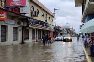 Streets flooded in Lima Nueva Cortes after two Category 4 storms hit the island. Streets flooded in Lima Nueva Cortes after two Category 4 storms hit the island.