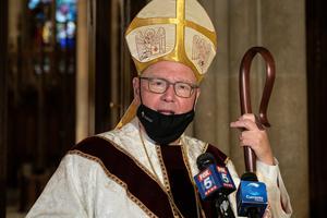 Cardinal Timothy Dolan speaks to media after the NYPD mass honoring members died of COVID-19 at St. Patrick's Cathedral. Cardinal Timothy Dolan speaks to media after the NYPD mass honoring members died of COVID-19 at St. Patrick's Cathedral.