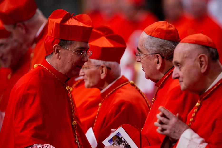 Cardinal Miguel Angel Ayuso Guixot (Left), President of the Pontifical Council for Interreligious Dialogue, after receiving the red biretta from Pope Francis during an Ordinary Public Consistory for the Creation of New Cardinals in St. Peter's Basilica on Oct. 5, 2019. Cardinal Miguel Angel Ayuso Guixot (Left), President of the Pontifical Council for Interreligious Dialogue, after receiving the red biretta from Pope Francis during an Ordinary Public Consistory for the Creation of New Cardinals in St. Peter's Basilica on Oct. 5, 2019.