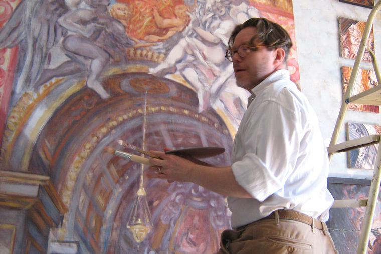Philippe Casanova works on a painting. Philippe Casanova works on a painting.