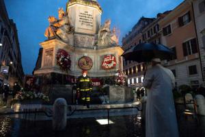 Pope Francis prays before the statue of the Immaculate Conception in Rome’s Piazza di Spagna Dec. 8, 2020.