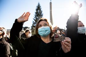 Pilgrims holding Nativity scenes attend the Pope’s Angelus in St. Peter’s Square on Dec. 13.