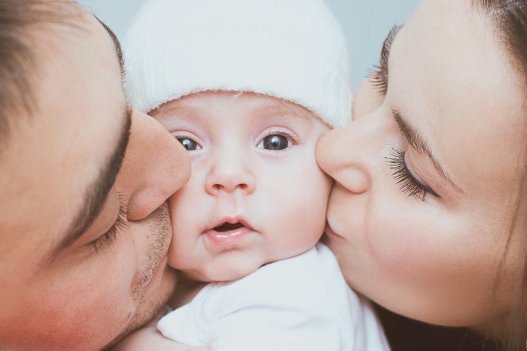 Young mother and father with newborn. Young mother and father with newborn.