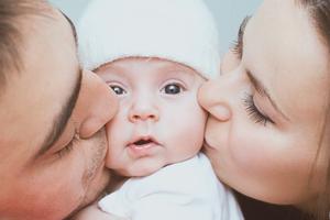Young mother and father with newborn. Young mother and father with newborn.
