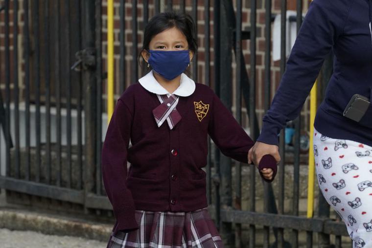 Children arrive for the first day of school at the St. Bartholomew Catholic Academy in the Queens section of New York on September 21, 2020. Children arrive for the first day of school at the St. Bartholomew Catholic Academy in the Queens section of New York on September 21, 2020.