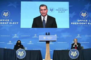 California Attorney General Xavier Becerra, who has been nominated by Biden to serve as secretary of Health and Human Services, speaks as President-elect Joe Biden (R) and Vice-President-elect Kamala Harris (L) look on as Biden announces his team tasked with dealing with the Covid-19 pandemic at The Queen in Wilmington, Delaware on December 8, 2020. California Attorney General Xavier Becerra, who has been nominated by Biden to serve as secretary of Health and Human Services, speaks as President-elect Joe Biden (R) and Vice-President-elect Kamala Harris (L) look on as Biden announces his team tasked with dealing with the Covid-19 pandemic at The Queen in Wilmington, Delaware on December 8, 2020.