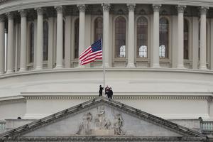 The American flag is lowered to half-staff atop the U.S. Capitol Building following the death of a U.S. Capitol Police Officer on January 08, 2021 in Washington, DC. The officer died after he was injured when a pro-Trump mob stormed and entered the Capitol Building on Wednesday. The American flag is lowered to half-staff atop the U.S. Capitol Building following the death of a U.S. Capitol Police Officer on January 08, 2021 in Washington, DC. The officer died after he was injured when a pro-Trump mob stormed and entered the Capitol Building on Wednesday.