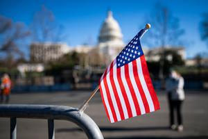 An American flag flies at a makeshift memorial for U.S. Capitol Police Officer Brian Sicknick, who was fatally injured when a pro-Trump mob stormed and entered the Capitol Building on Wednesday, near the West Front of the U.S. Capitol on January 9, 2021 in Washington, DC. An American flag flies at a makeshift memorial for U.S. Capitol Police Officer Brian Sicknick, who was fatally injured when a pro-Trump mob stormed and entered the Capitol Building on Wednesday, near the West Front of the U.S. Capitol on January 9, 2021 in Washington, DC.