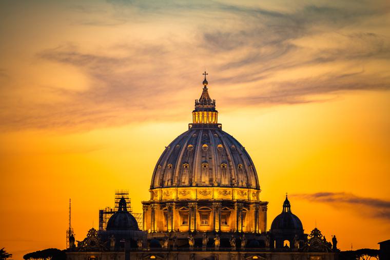 Dome of St. Peter's Basilica at sunset. Dome of St. Peter's Basilica at sunset.
