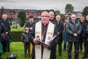 Archbishop Philip Tartaglia gives a blessing at a commemoration of the founding fathers of Celtic F.C. at St Peter’s Cemetery, Dalbeth, Glasgow, Nov. 2, 2013. Archbishop Philip Tartaglia gives a blessing at a commemoration of the founding fathers of Celtic F.C. at St Peter’s Cemetery, Dalbeth, Glasgow, Nov. 2, 2013.