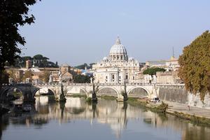 St. Peter’s Basilica is seen across the Tiber River. St. Peter’s Basilica is seen across the Tiber River.