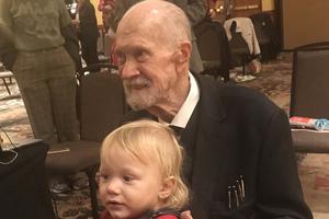 Pro-life legend Joe Scheidler holds his grandchild 2020. Pro-life legend Joe Scheidler holds his grandchild 2020.