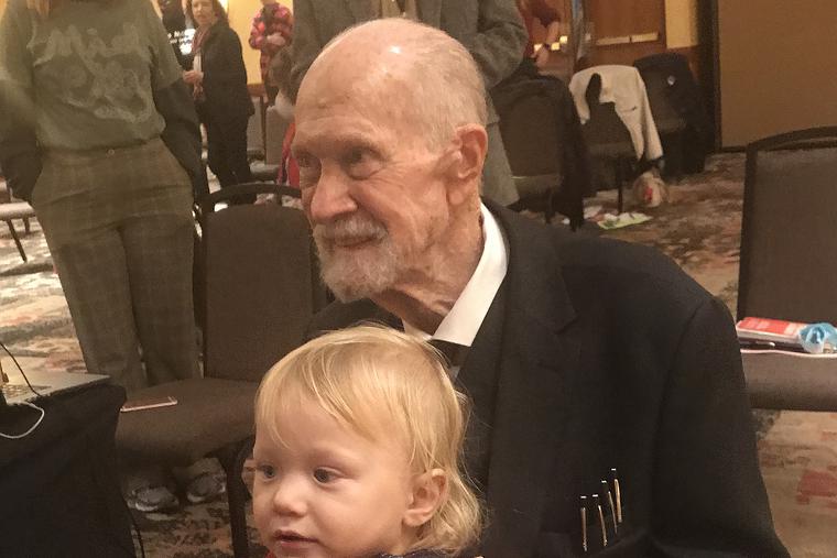 Pro-life legend Joe Scheidler holds his grandchild 2020. Pro-life legend Joe Scheidler holds his grandchild 2020.