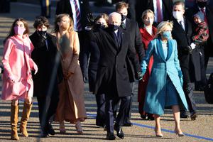 U.S. President Joe Biden and first lady Jill Biden and their family walk the abbreviated parade route after Biden's inauguration on Jan. 20 in Washington. Biden became the 46th president of the United States earlier today during the ceremony at the U.S. Capitol. U.S. President Joe Biden and first lady Jill Biden and their family walk the abbreviated parade route after Biden's inauguration on Jan. 20 in Washington. Biden became the 46th president of the United States earlier today during the ceremony at the U.S. Capitol.