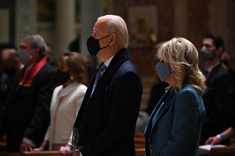 President-elect Joe Biden (C) and incoming First Lady Jill Biden attend Mass at the Cathedral of St. Matthew the Apostle in Washington, DC, on January 20, 2021. President-elect Joe Biden (C) and incoming First Lady Jill Biden attend Mass at the Cathedral of St. Matthew the Apostle in Washington, DC, on January 20, 2021.