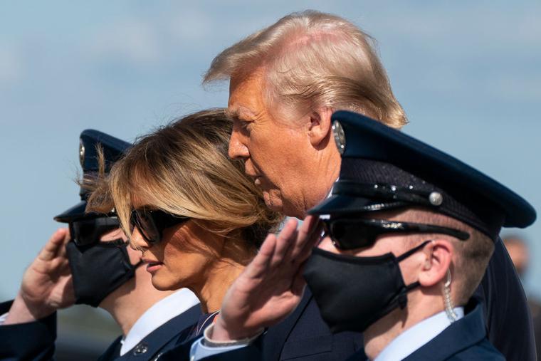 Outgoing President Donald Trump and First Lady Melania Trump exit Air Force One as they arrive at Palm Beach International Airport in West Palm Beach, Florida, on January 20, 2021. Outgoing President Donald Trump and First Lady Melania Trump exit Air Force One as they arrive at Palm Beach International Airport in West Palm Beach, Florida, on January 20, 2021.