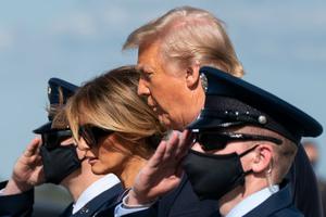 Outgoing President Donald Trump and First Lady Melania Trump exit Air Force One as they arrive at Palm Beach International Airport in West Palm Beach, Florida, on January 20, 2021. Outgoing President Donald Trump and First Lady Melania Trump exit Air Force One as they arrive at Palm Beach International Airport in West Palm Beach, Florida, on January 20, 2021.