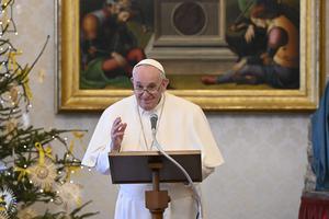 Pope Francis delivers his Angelus address in the library of the Apostolic Palace Jan. 6, 2021. Pope Francis delivers his Angelus address in the library of the Apostolic Palace Jan. 6, 2021.