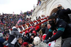 A mob storms the U.S. Capitol on Jan. 6. A mob storms the U.S. Capitol on Jan. 6.