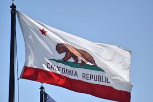 California flag flying in the wind. California flag flying in the wind.