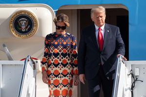 Outgoing U.S. President Donald Trump and First Lady Melania Trump exit Air Force One at the Palm Beach International Airport on the way to Mar-a-Lago Club on January 20, 2020 in West Palm Beach, Florida. Outgoing U.S. President Donald Trump and First Lady Melania Trump exit Air Force One at the Palm Beach International Airport on the way to Mar-a-Lago Club on January 20, 2020 in West Palm Beach, Florida.