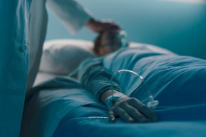 A doctor visits a sick patient in the hospital. A doctor visits a sick patient in the hospital.