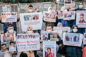 Members of the Muslim Uyghur minority hold placards as they demonstrate in front of the Chinese consulate on Dec. 30, 2020, in Istanbul, to ask for news of their relatives and to express their concern after China announced the ratification of an extradition treaty with Turkey. Members of the Muslim Uyghur minority hold placards as they demonstrate in front of the Chinese consulate on Dec. 30, 2020, in Istanbul, to ask for news of their relatives and to express their concern after China announced the ratification of an extradition treaty with Turkey.