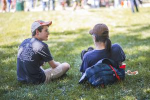 A Christ in the City missionary spends time with a friend during lunch at Denver’s Civic Center Park. A Christ in the City missionary spends time with a friend during lunch at Denver’s Civic Center Park.