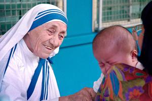 St. Teresa of Calcutta greets a child at the Gift of Love Home on Oct. 20, 1993, in Singapore. St. Teresa of Calcutta greets a child at the Gift of Love Home on Oct. 20, 1993, in Singapore.