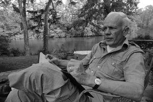 Novelist Walker Percy sits in his Covington, La., yard, June 8, 1977. Novelist Walker Percy sits in his Covington, La., yard, June 8, 1977.