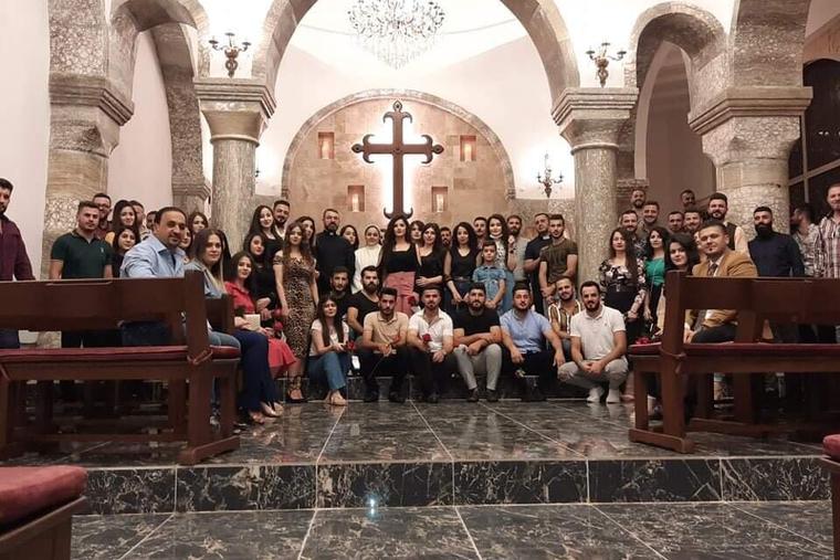 Young adults at St. George Chaldean Catholic Church in Telskuf, Iraq. Young adults at St. George Chaldean Catholic Church in Telskuf, Iraq.