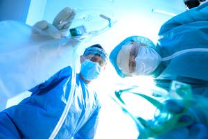 Doctors perform CPR on a COVID patient. Doctors perform CPR on a COVID patient.