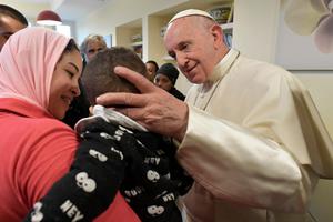 Pope Francis made a surprise visit to CasAmica onlus, a centre that provides short-term housing to hospital patients and their families on the southern edge of Rome Dec. 7, 2018.