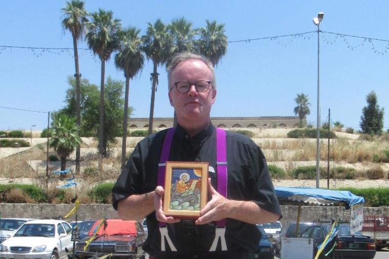 Father Benedict Kiely is shown standing opposite the tomb of Jonah in Mosul (Nineveh), Iraq, in July 2019. He holds an icon of the prophet Jonah. Father Kiely makes frequent trips to Iraq to help the beleaguered Christians there. Father Benedict Kiely is shown standing opposite the tomb of Jonah in Mosul (Nineveh), Iraq, in July 2019. He holds an icon of the prophet Jonah. Father Kiely makes frequent trips to Iraq to help the beleaguered Christians there.