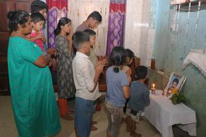 The family of Antony Akkaraparambil, who died tragically Feb. 12, prays together on Feb. 20 at their home in Adat. The family of Antony Akkaraparambil, who died tragically Feb. 12, prays together on Feb. 20 at their home in Adat.