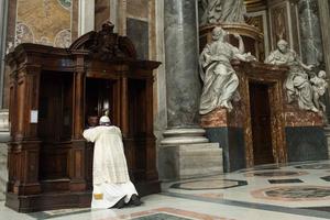 Pope Francis goes to Confession during a penitential celebration at St. Peter's Basilica on March 28, 2014. Pope Francis goes to Confession during a penitential celebration at St. Peter's Basilica on March 28, 2014.