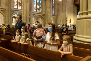 A family prays during St. Patrick's Cathedral Sunday Mass in Manhattan in June, 2020. A family prays during St. Patrick's Cathedral Sunday Mass in Manhattan in June, 2020.