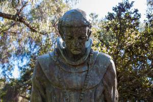 A statue with the bowed head of Father Junipero Serra is shown at the Serra Mission Museum. A statue with the bowed head of Father Junipero Serra is shown at the Serra Mission Museum.