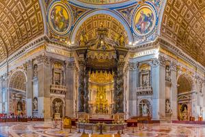Baldacchino altar and ornate frescoes inside Saint Peter's Basilica in Vatican City. Baldacchino altar and ornate frescoes inside Saint Peter's Basilica in Vatican City.